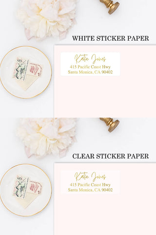 a set of three white and gold place cards