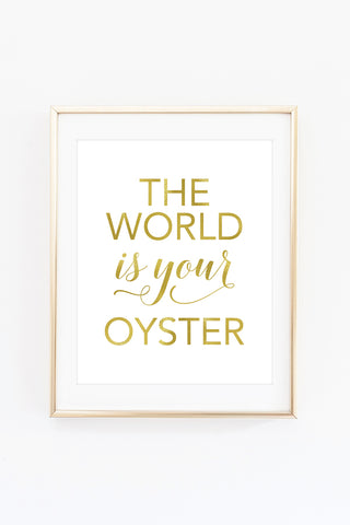 the world is your oyster art print in a gold frame