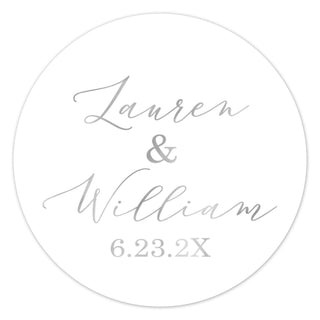 a white round wedding sticker with the words lauren and william on it