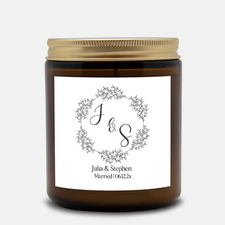 a jar of jam with a monogrammed label