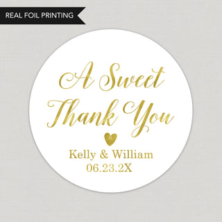 a round sticker with the words a sweet thank you on it