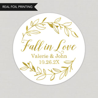 a round sticker with the words fall in love on it