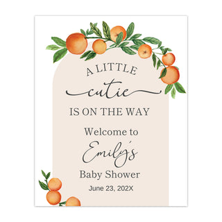 a baby shower sign with oranges on it