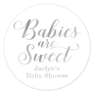 a round sticker with the words babies are sweet on it