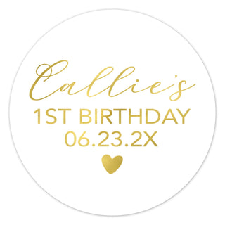 a white round sticker with gold foil on it