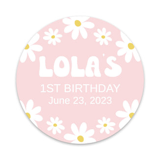 a pink birthday sticker with daisies on it