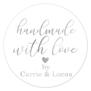 a round sticker with the words handmade with love written on it