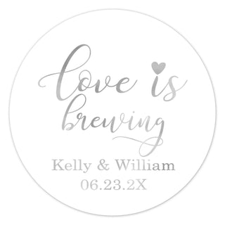 a round sticker with the words love is brewing printed on it
