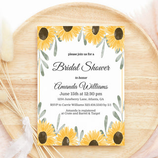 a sunflower bridal shower is on a wooden plate