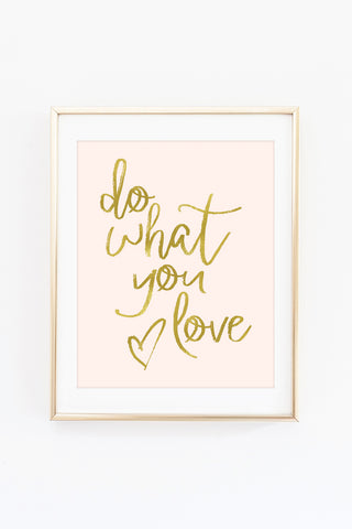 a pink and gold framed print with the words do what you love