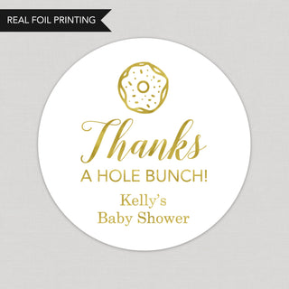 a round sticker with a donut on it that says thanks a hole bunch