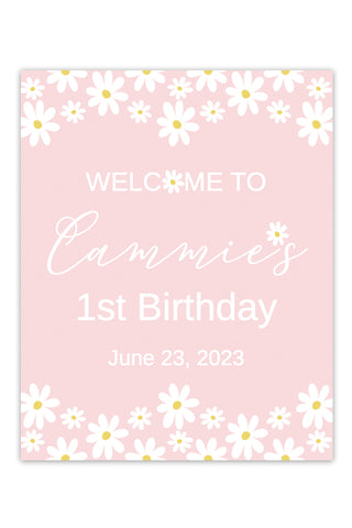 a pink and white sign with daisies on it