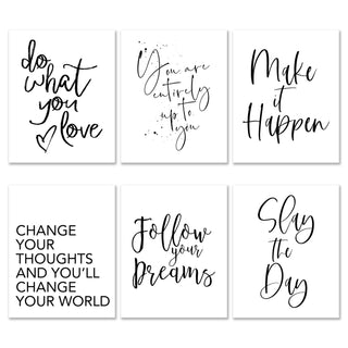 four black and white prints with different phrases