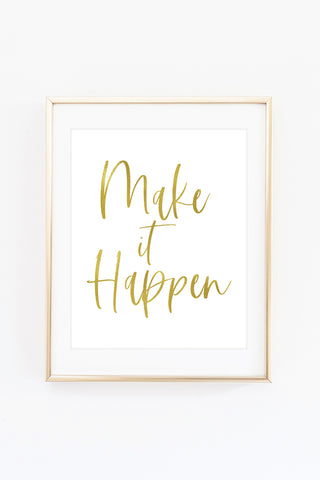 a white and gold framed print with the words make it happen