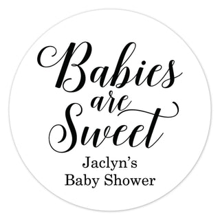 a round sticker with the words babies are sweet
