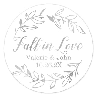 a round sticker with the words fall in love on it