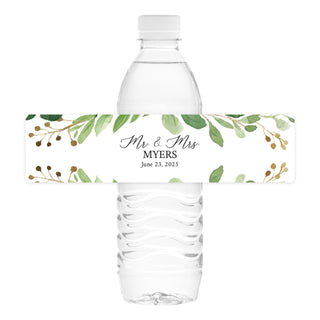 a water bottle label with leaves and berries on it