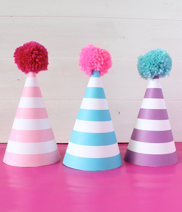 Free Printable Striped Party Hats (in 12 colors) from @chicfetti
